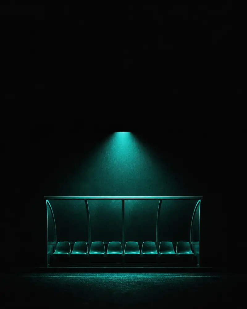 An empty bench in a dark dressing room